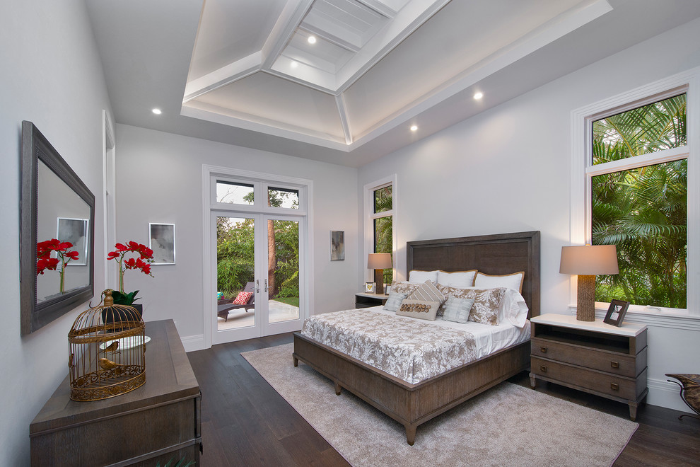 Large transitional guest bedroom in Miami.