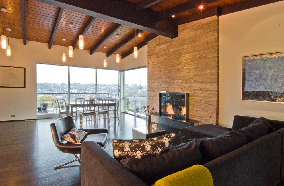 Inspiration for a modern living room in Seattle with a standard fireplace.