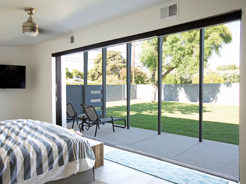 This is an example of a midcentury bedroom in Phoenix.
