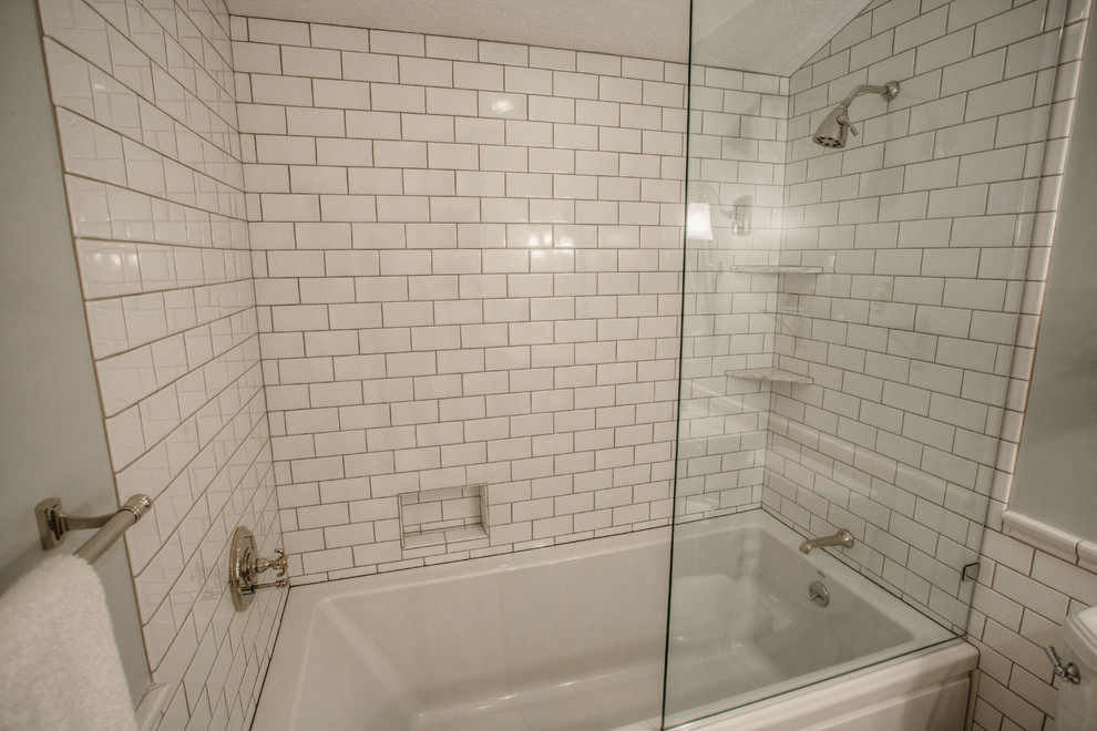 Design ideas for a mid-sized transitional master bathroom in Other with white cabinets, an alcove tub, a shower/bathtub combo, white tile, grey walls, ceramic floors, an undermount sink and quartzite benchtops.