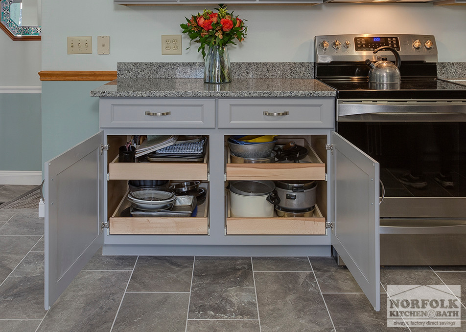 Inspiration for a mid-sized transitional u-shaped home design remodel in Boston with an undermount sink, shaker cabinets, gray cabinets, granite countertops, stainless steel appliances and no island