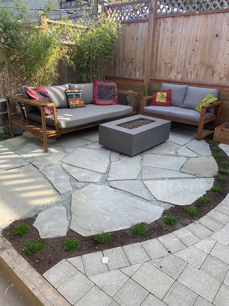 This is an example of a rustic patio in Vancouver.