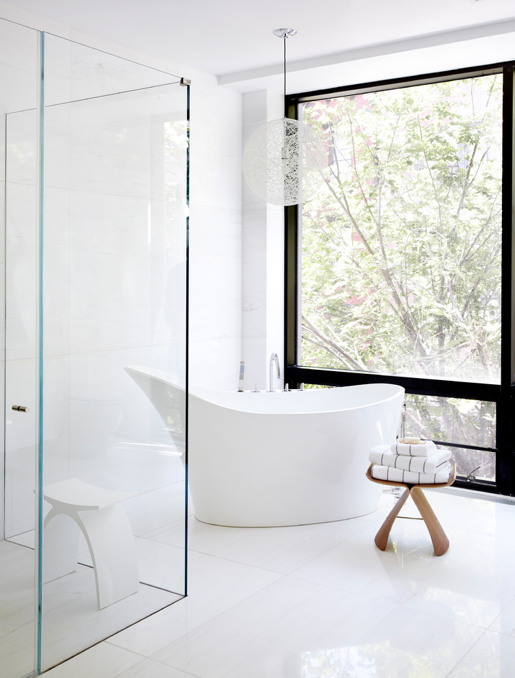 Large modern master bathroom in Other with flat-panel cabinets, white cabinets, a freestanding tub, an open shower, quartzite benchtops, a hinged shower door, white benchtops, a one-piece toilet, white walls, porcelain floors, an integrated sink and white floor.