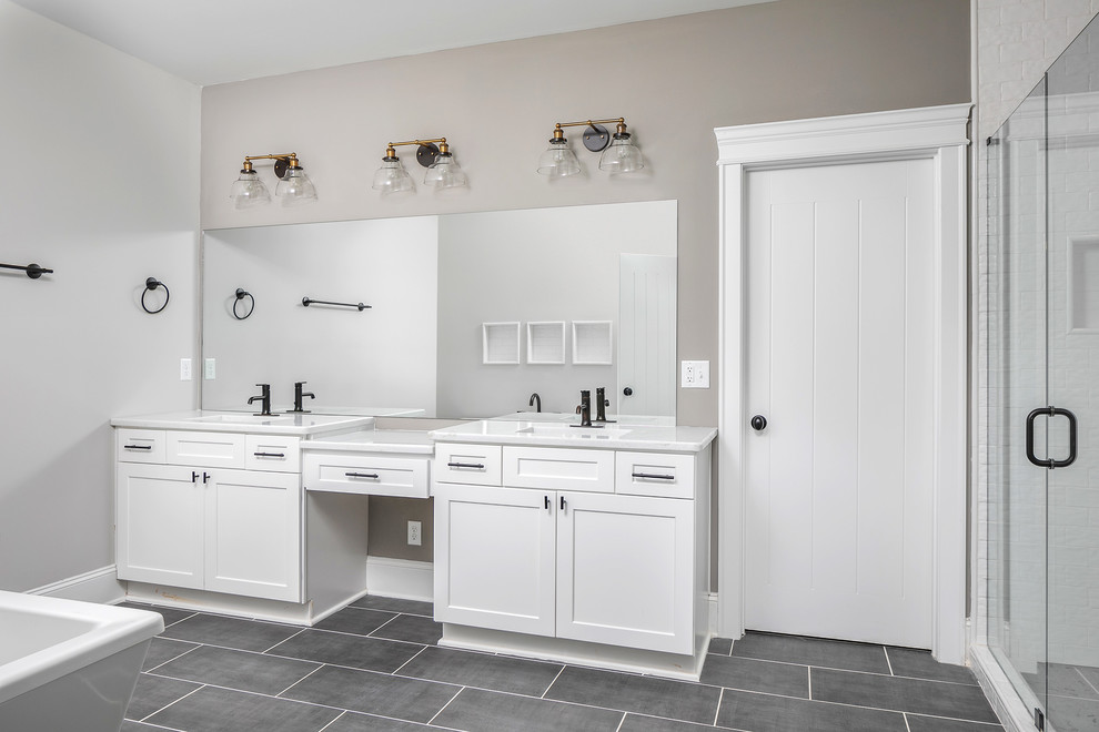 Mid-sized modern master bathroom in Other with shaker cabinets, white cabinets, an alcove shower, grey walls, porcelain floors, an undermount sink, solid surface benchtops, black floor, a hinged shower door and white benchtops.