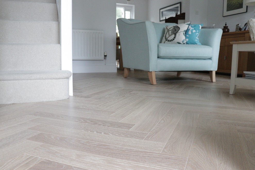Design ideas for a contemporary living room in Cambridgeshire with light hardwood floors.