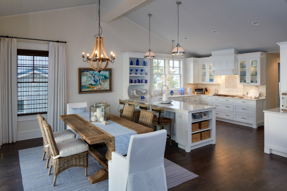 Inspiration for a beach style kitchen/dining combo in DC Metro with beige walls and dark hardwood floors.