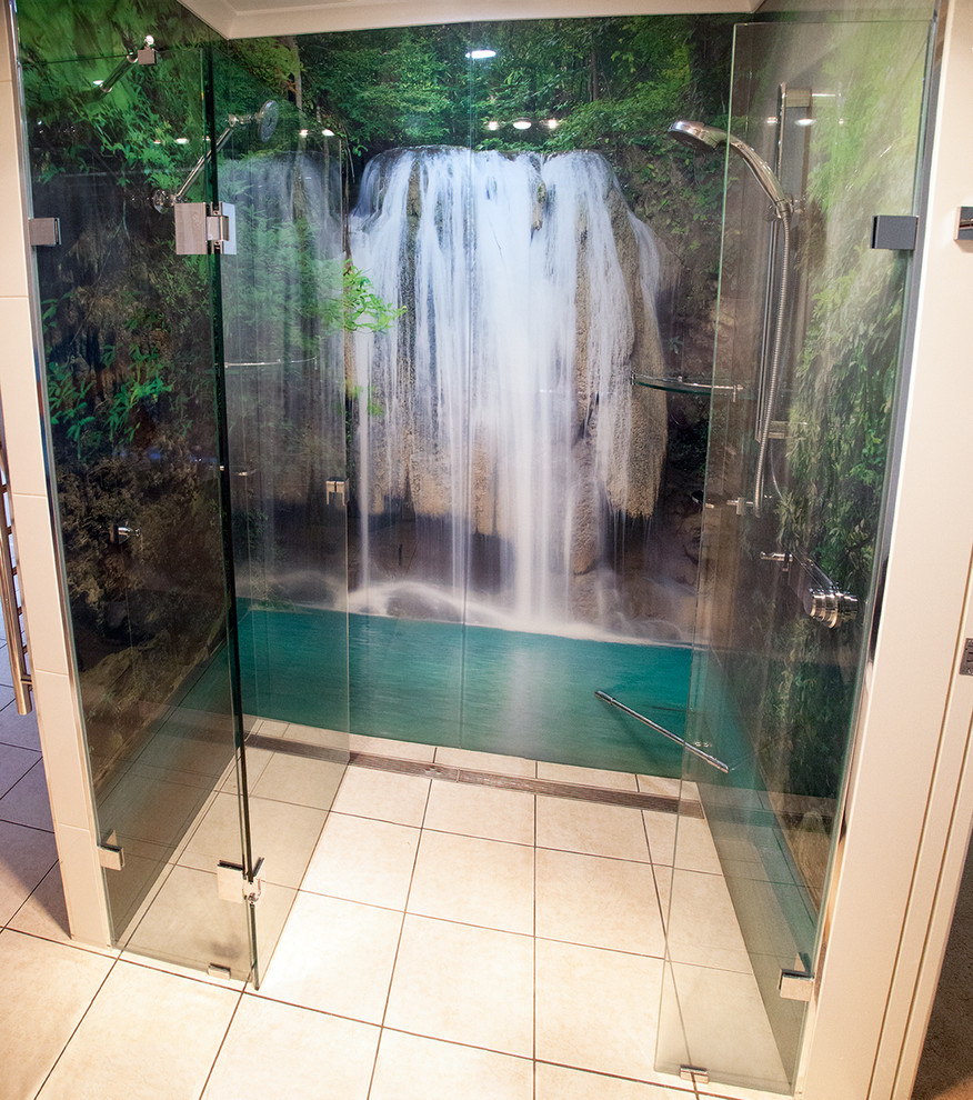 Design ideas for a tropical bathroom in Other with a double shower, glass sheet wall, ceramic floors and a hinged shower door.