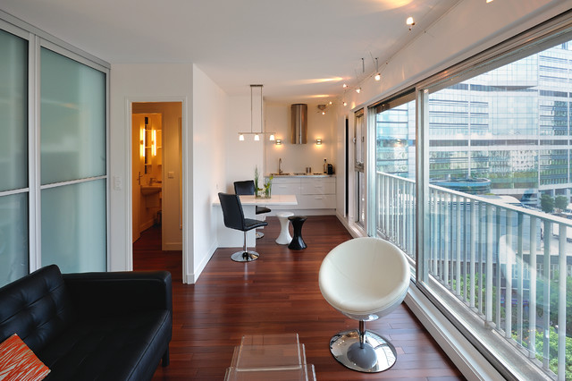 Studio avec espace de couchage dissimul&eacute; modern-wohnzimmer