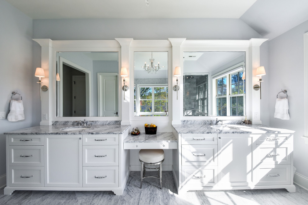 Large elegant master marble floor, gray floor and double-sink bathroom photo in Chicago with recessed-panel cabinets, white cabinets, a two-piece toilet, gray walls, an undermount sink, marble countertops, a hinged shower door, gray countertops, a niche and a built-in vanity