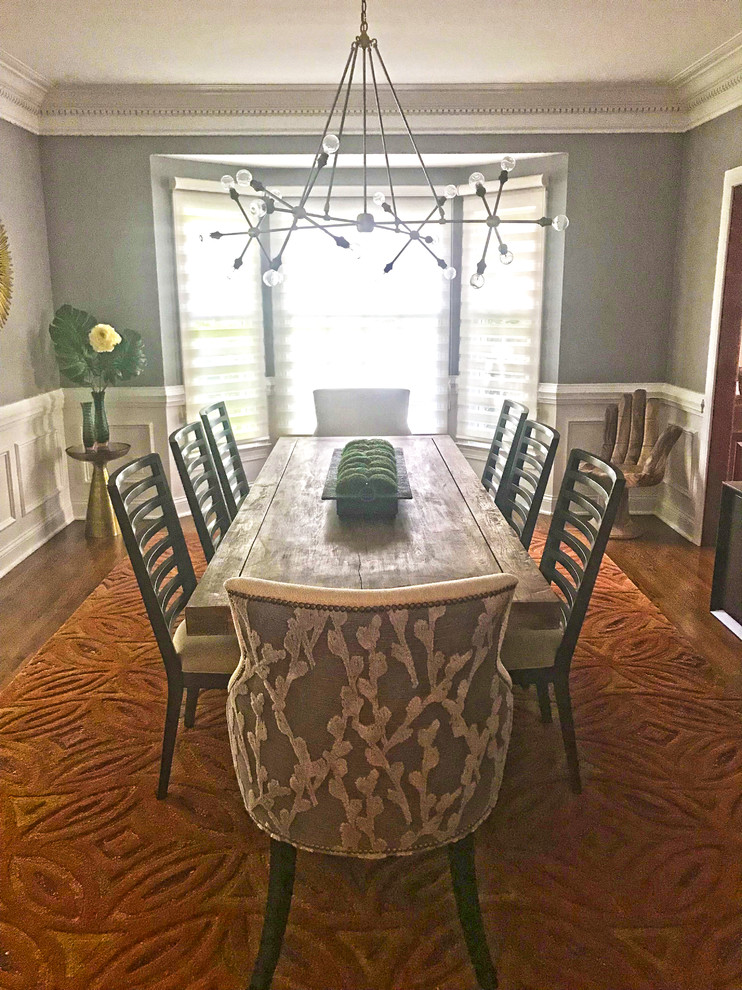 Example of a transitional dining room design in Orange County
