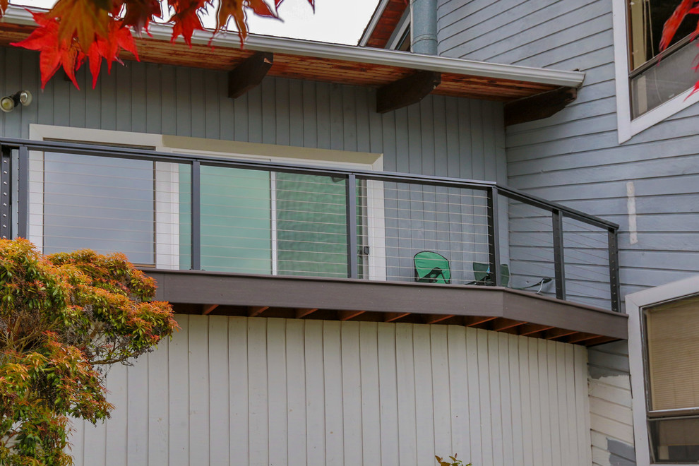 Deck - large coastal side yard deck idea in Seattle