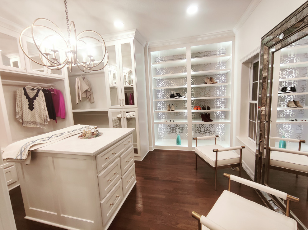 Design ideas for a medium sized traditional dressing room for women in Little Rock with medium hardwood flooring.