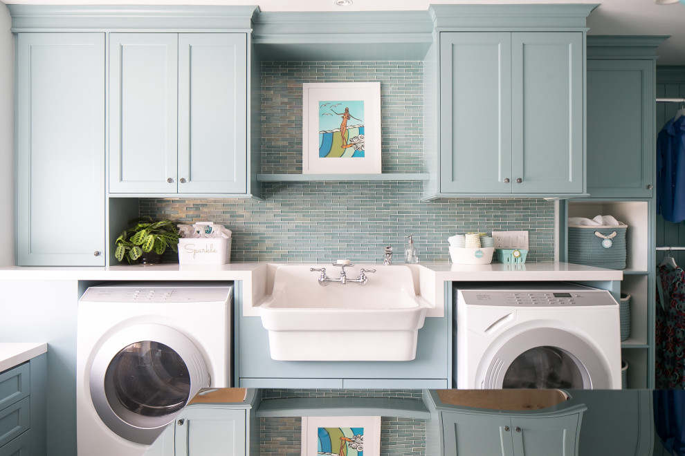 Design ideas for a beach style galley dedicated laundry room in Orange County with an utility sink, shaker cabinets, turquoise cabinets, a side-by-side washer and dryer and white benchtop.