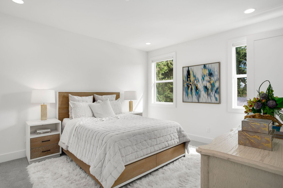 Mid-sized contemporary bedroom in Seattle with white walls, carpet and grey floor.