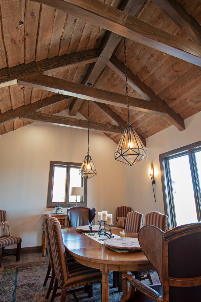 Enclosed dining room - rustic medium tone wood floor, brown floor and wood ceiling enclosed dining room idea with beige walls