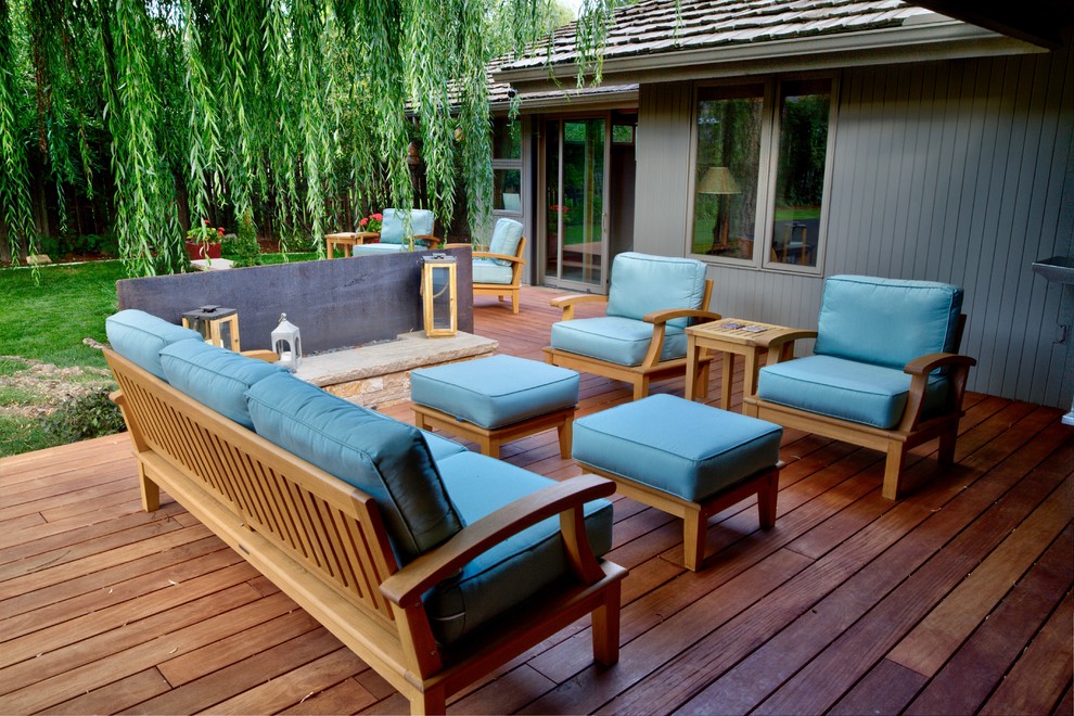 Mid-sized contemporary backyard deck in Denver with no cover.