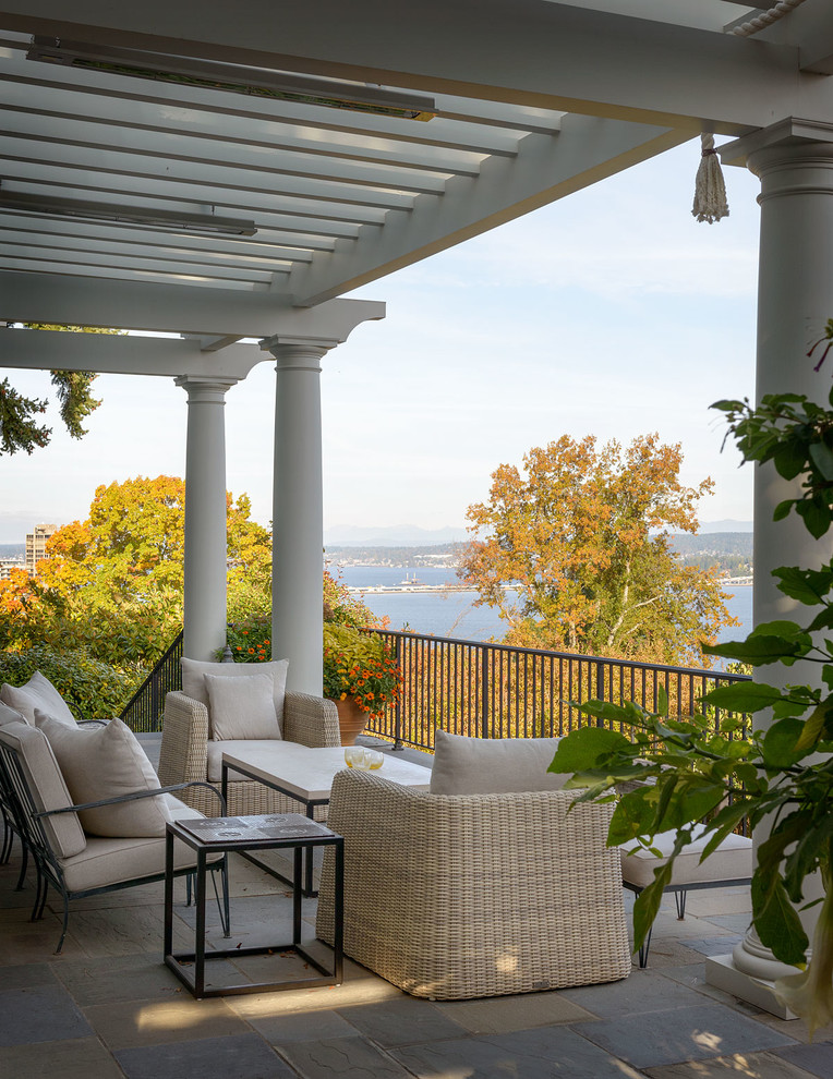 Inspiration for a traditional verandah in Seattle with a pergola.