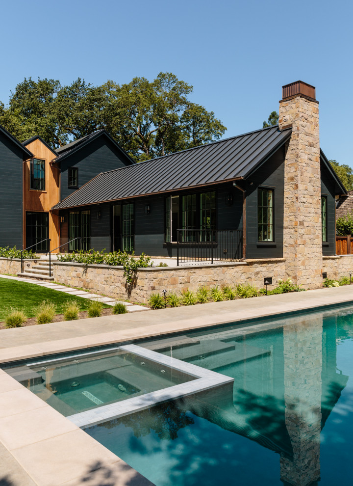 Ross Custom Home - Thoughtful design and detailed craft combine to create this timelessly elegant custom home. The contemporary vocabulary and classic gabled roof harmonize with the surrounding neighborhood and natural landscape. Built from the ground up, a two story structure in the front contains the private quarters, while the one story extension in the rear houses the Great Room - kitchen, dining and living - with vaulted ceilings and ample natural light. Large sliding doors open from the Great Room onto a south-facing patio and lawn creating an inviting indoor/outdoor space for family and friends to gather.

Chambers + Chambers Architects
Stone Interiors
Federika Moller Landscape Architecture
Alanna Hale Photography