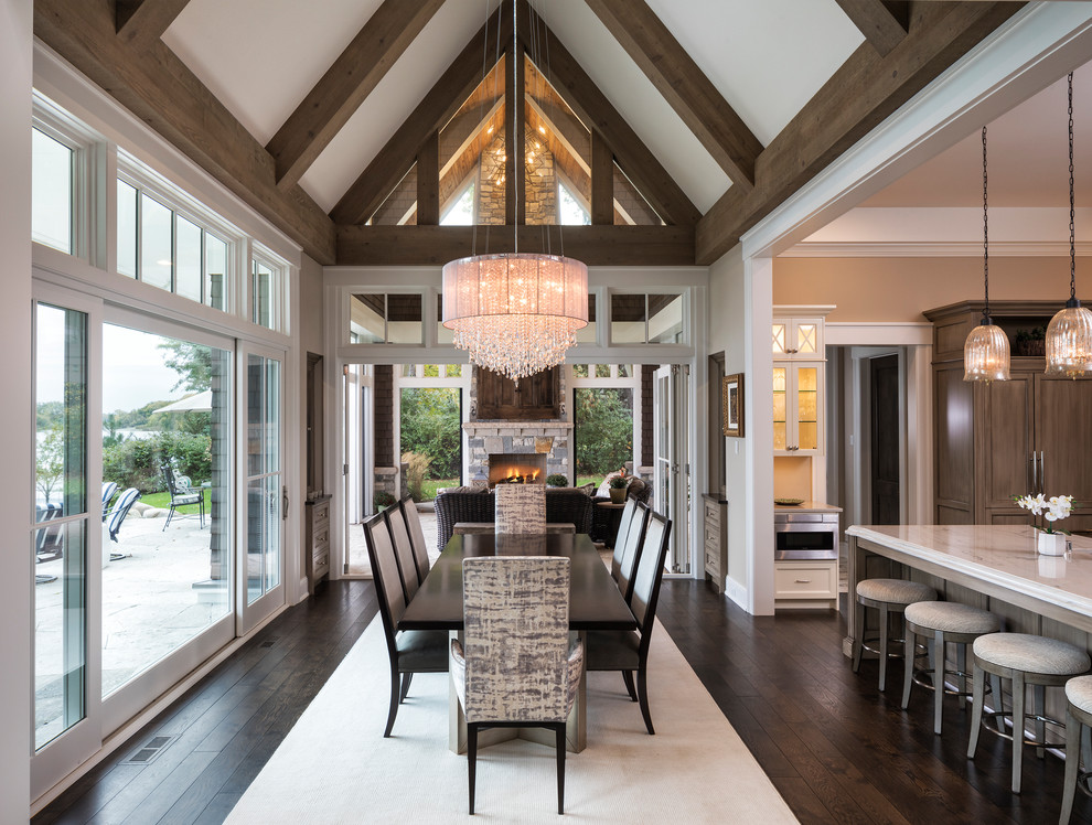 Example of a large transitional l-shaped brown floor kitchen/dining room combo design in Minneapolis with a single-bowl sink, quartzite countertops and stainless steel appliances