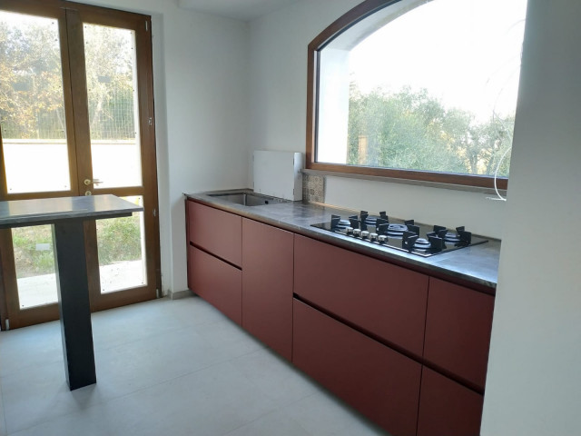 E0 fenix rosso Jaipur e castagno termizzato rustic-kitchen