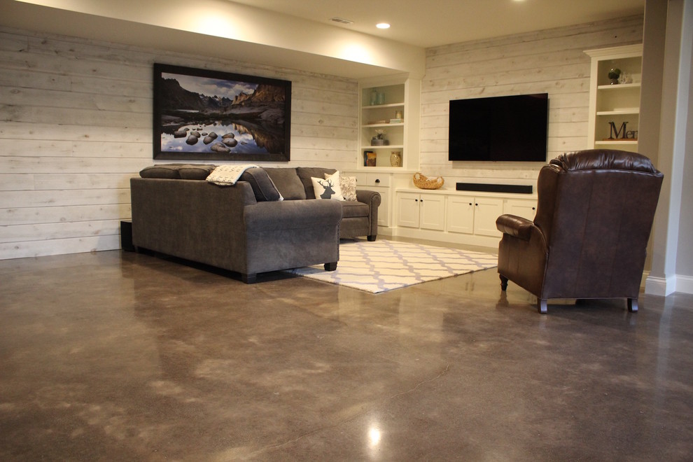 Inspiration for an arts and crafts basement in Other with concrete floors.