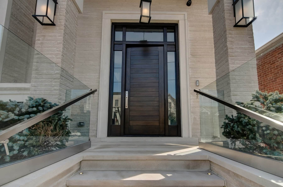 This is an example of a medium sized traditional front door in Toronto with grey walls, concrete flooring, a single front door, a brown front door, grey floors and a wood ceiling.