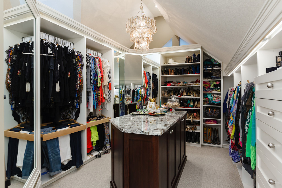 Large traditional women's walk-in wardrobe in Toronto with open cabinets, white cabinets, carpet and grey floor.