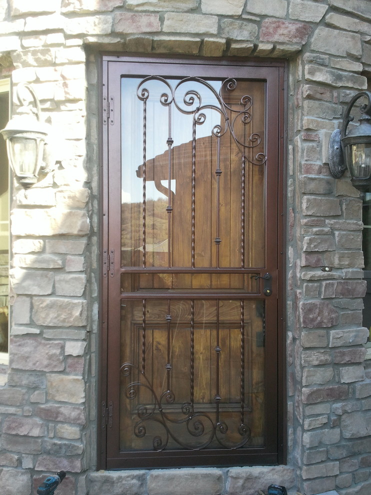 Photo of a mediterranean entryway in Denver.