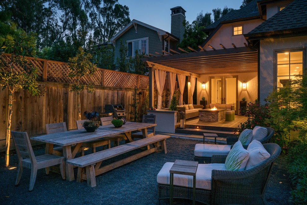 Design ideas for a mid-sized contemporary backyard partial sun formal garden for spring in San Francisco with gravel.