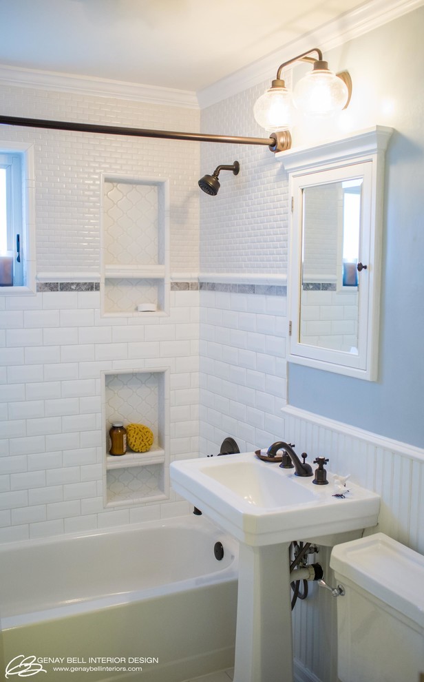 Inspiration for a small traditional 3/4 bathroom in Seattle with an alcove tub, a shower/bathtub combo, white tile, ceramic tile, blue walls, porcelain floors, a pedestal sink and white floor.