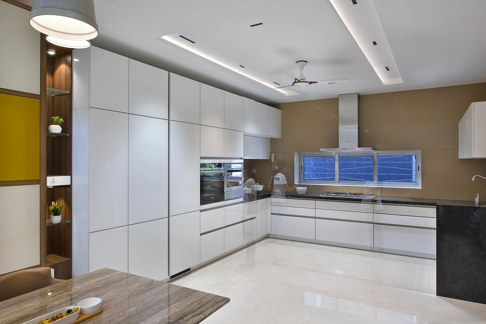 Design ideas for a contemporary kitchen in Mumbai.