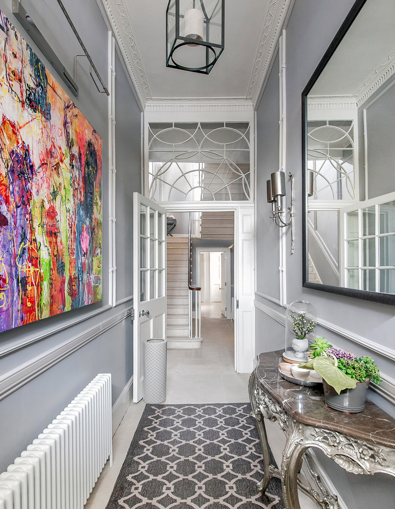 Design ideas for a mid-sized eclectic vestibule with grey walls.