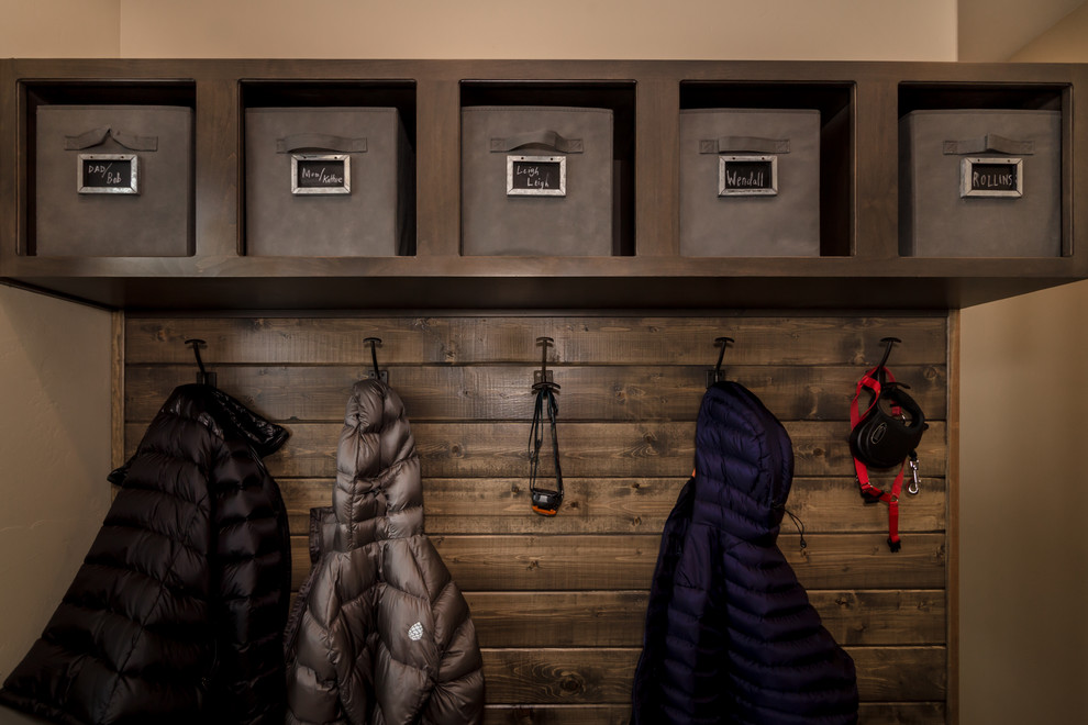 Example of a small mountain style slate floor and gray floor mudroom design in Denver with beige walls
