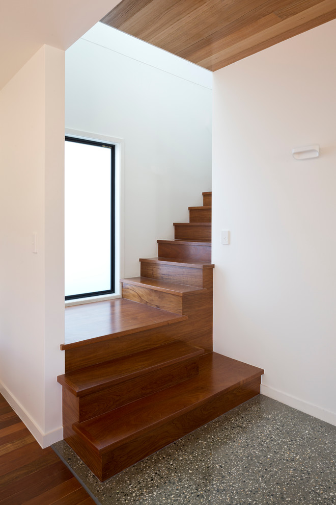 This is an example of a contemporary staircase in Gold Coast - Tweed.