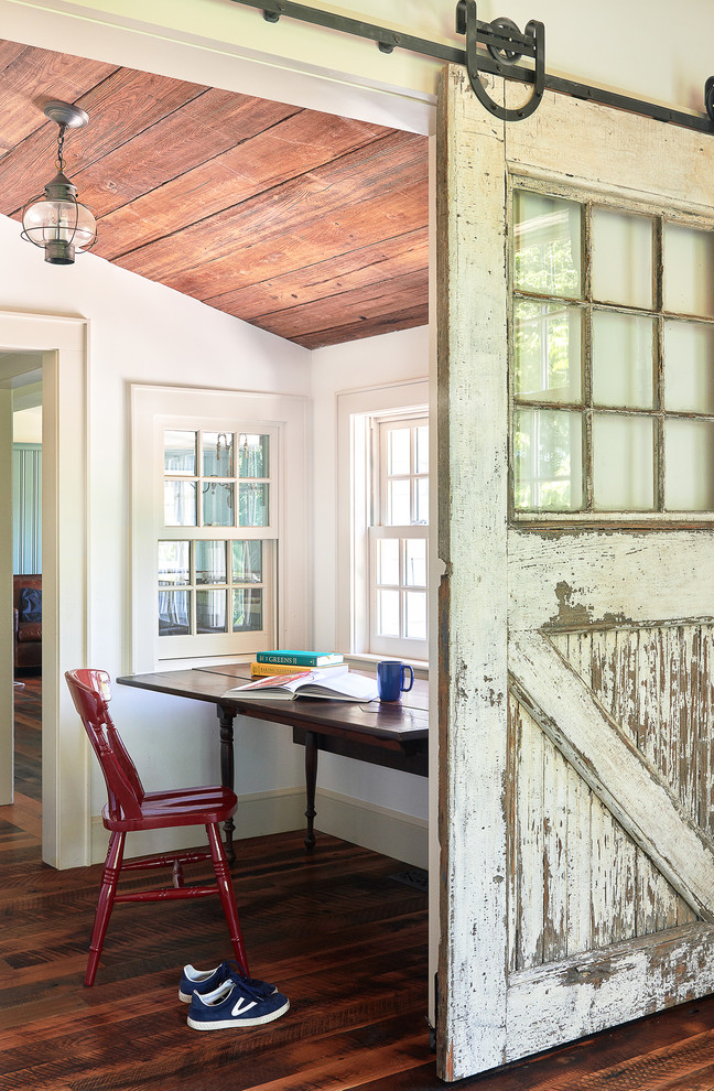 Inspiration for a country home office in New York with white walls, dark hardwood floors and a freestanding desk.