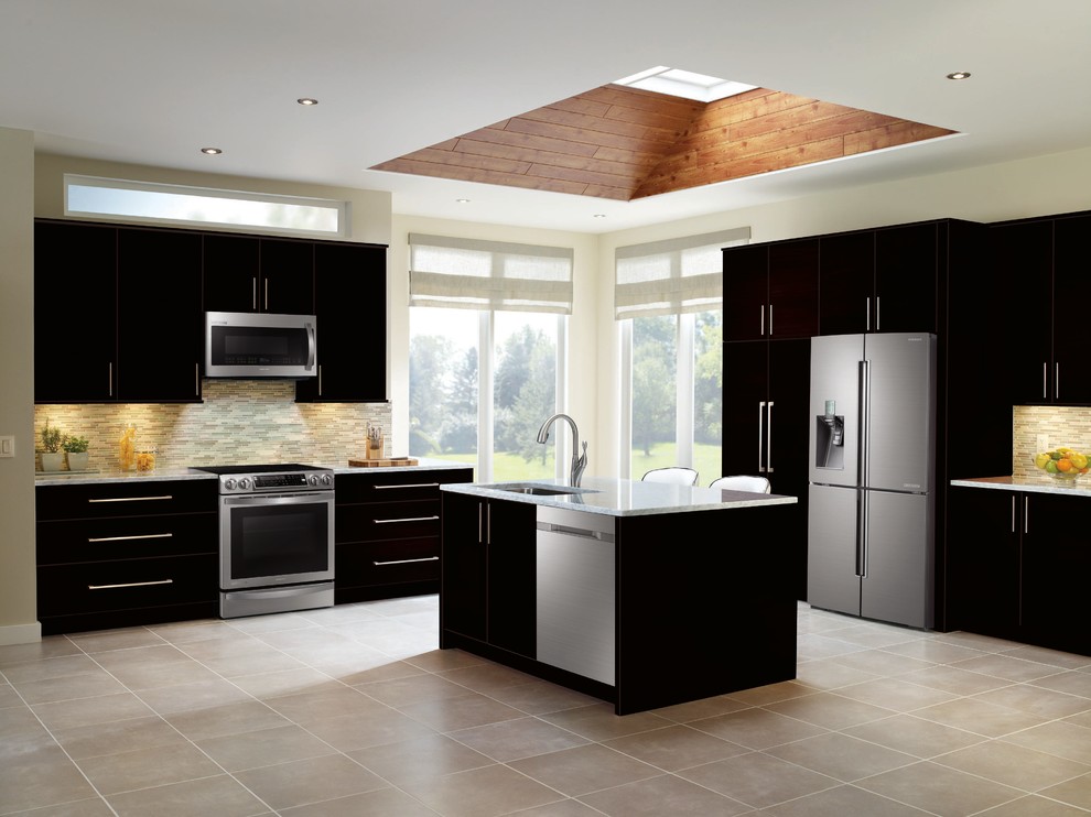 Design ideas for a large transitional l-shaped kitchen in Vancouver with an undermount sink, flat-panel cabinets, black cabinets, marble benchtops, multi-coloured splashback, matchstick tile splashback, stainless steel appliances, ceramic floors and with island.