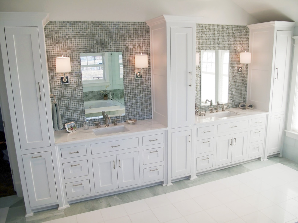 Inspiration for a traditional bathroom in Dallas with shaker cabinets and mosaic tile.