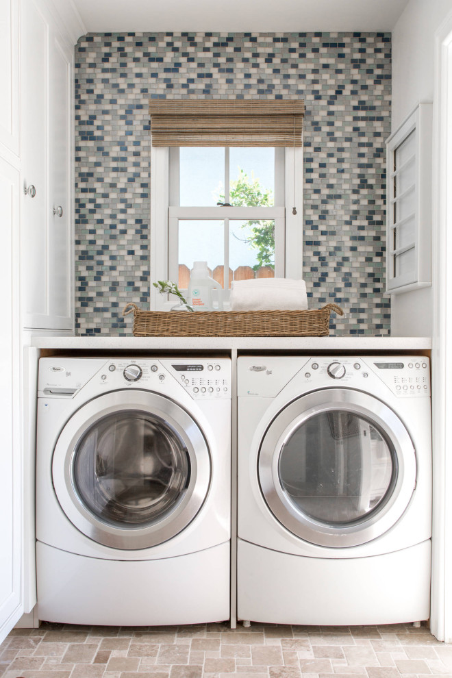 Dedicated laundry room - mid-sized transitional dedicated laundry room idea with a side-by-side washer/dryer