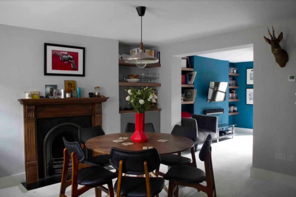 This is an example of a contemporary dining room in Sussex.