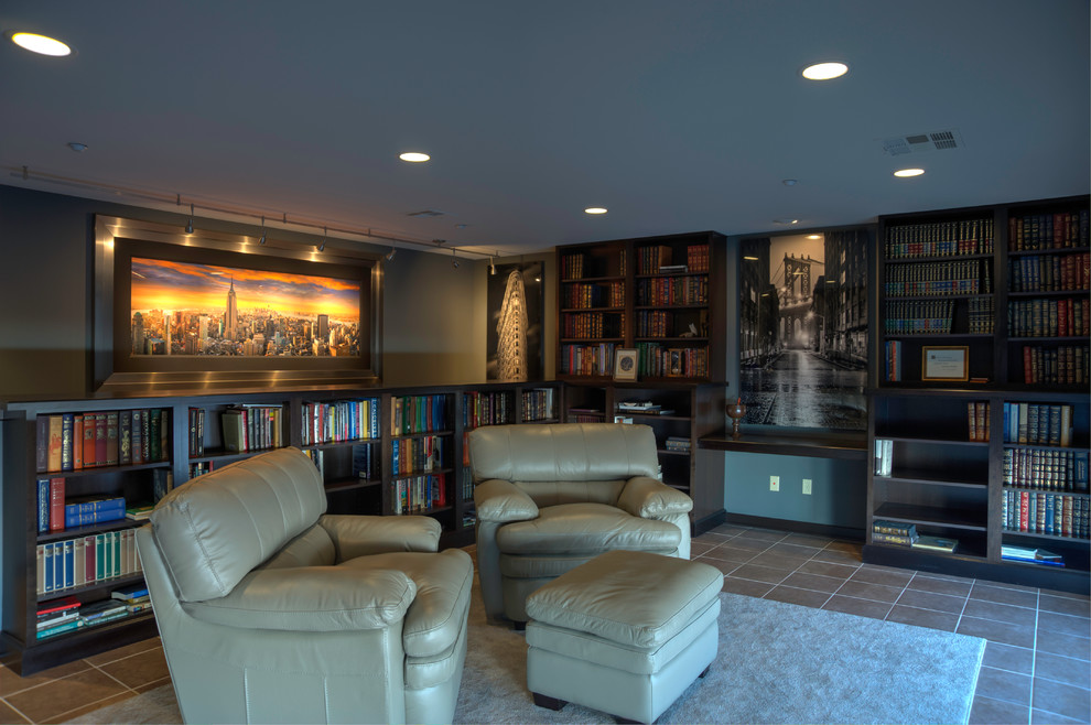 This is an example of a mid-sized modern enclosed family room in Wichita with a library, grey walls, porcelain floors, no fireplace, no tv and brown floor.
