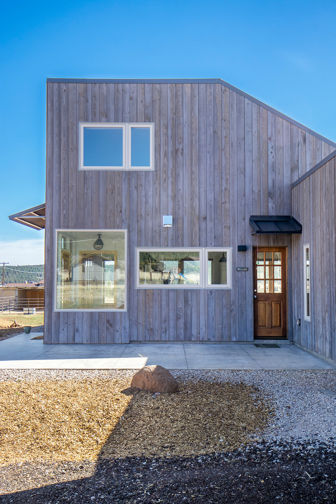Inspiration for a rustic home design remodel in Phoenix