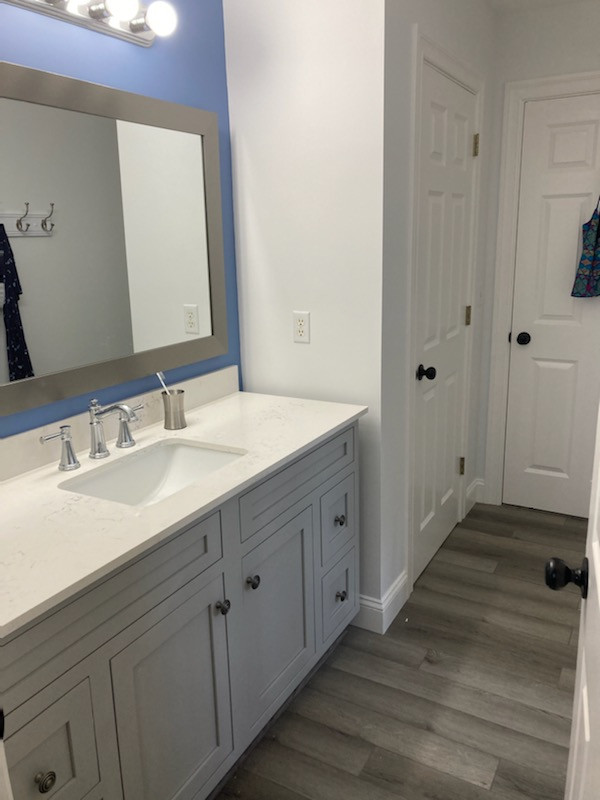 Inspiration for a mid-sized transitional kids' single-sink bathroom remodel in Boston with beaded inset cabinets, gray cabinets, gray walls, an undermount sink, quartz countertops, white countertops and a built-in vanity