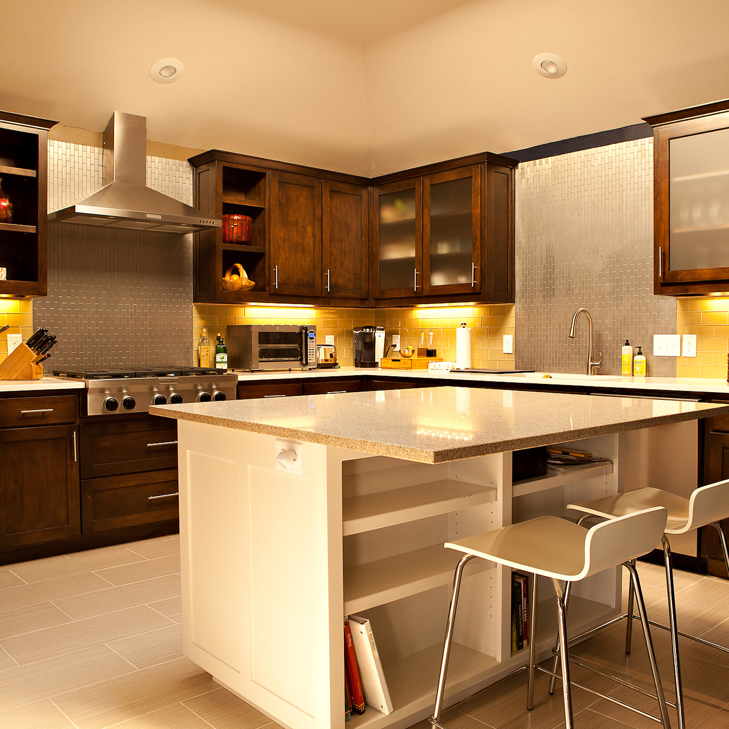 North Dallas Contemporary Kitchen remodel featuring dark cherry shaker cabinets some with a frosted glass inlay, professional grade stainless steel Kitchen Aid appliances, quartz countertops, undermou