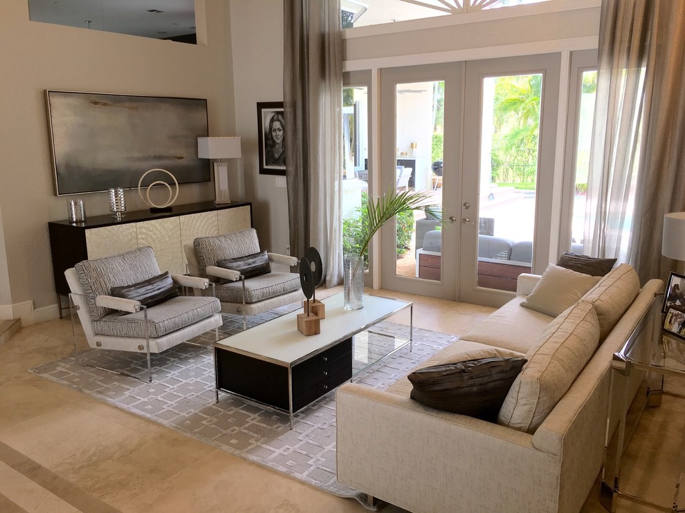 Photo of a mid-sized contemporary formal open concept living room in Miami with grey walls, porcelain floors, no fireplace, no tv and beige floor.