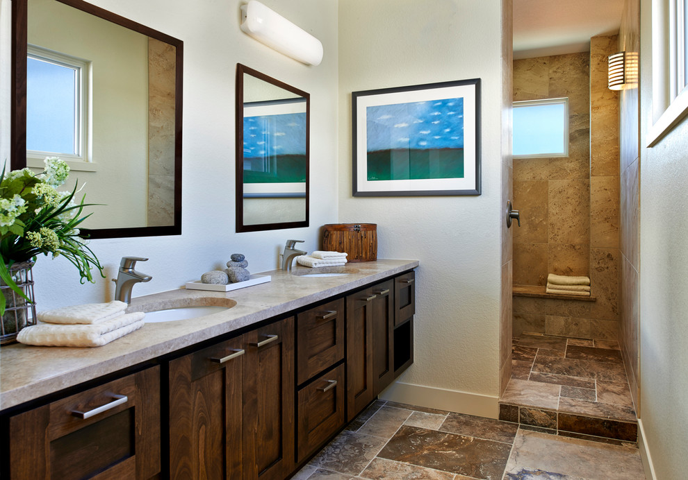 This is an example of a contemporary bathroom in Denver with an undermount sink, shaker cabinets, dark wood cabinets, an open shower, brown tile, an open shower and beige benchtops.