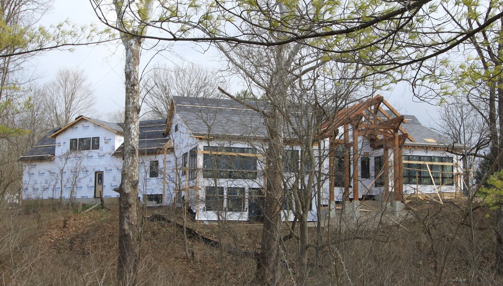 Example of a mountain style home design design in Indianapolis