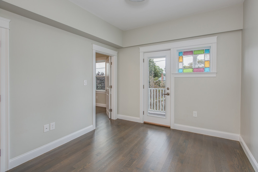 Mid-sized transitional dark wood floor and brown floor front door photo in Boston with beige walls and a glass front door