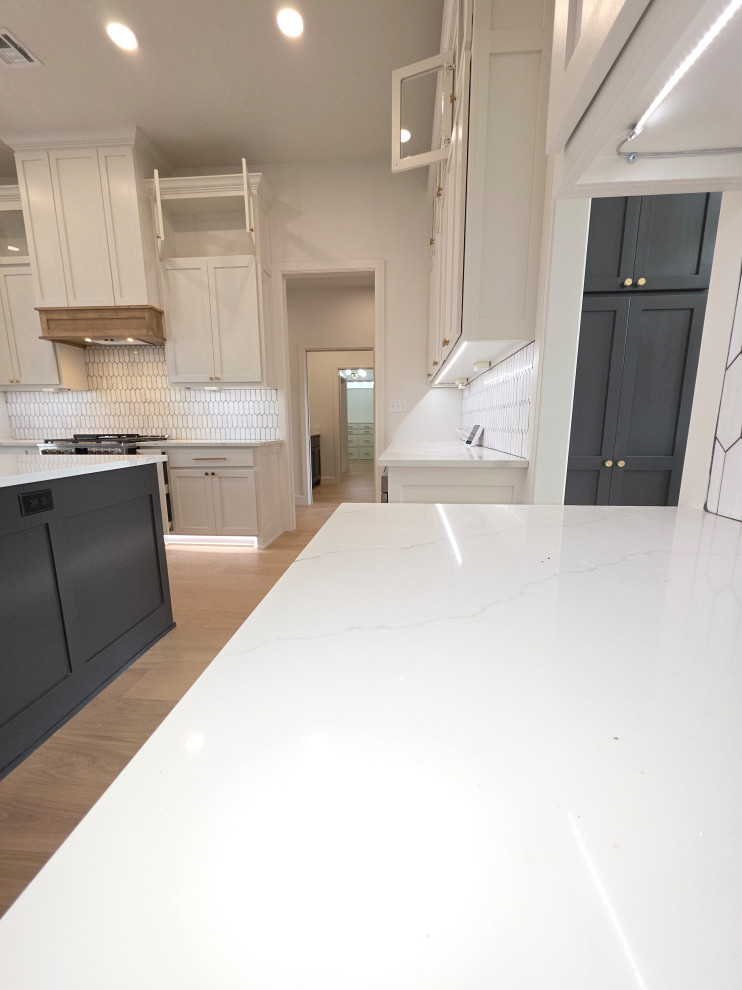 Easy care Quartz countertops & tile backsplash