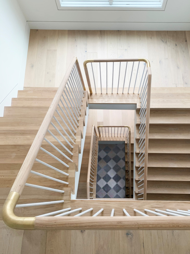 Photo of a large transitional staircase in New York.