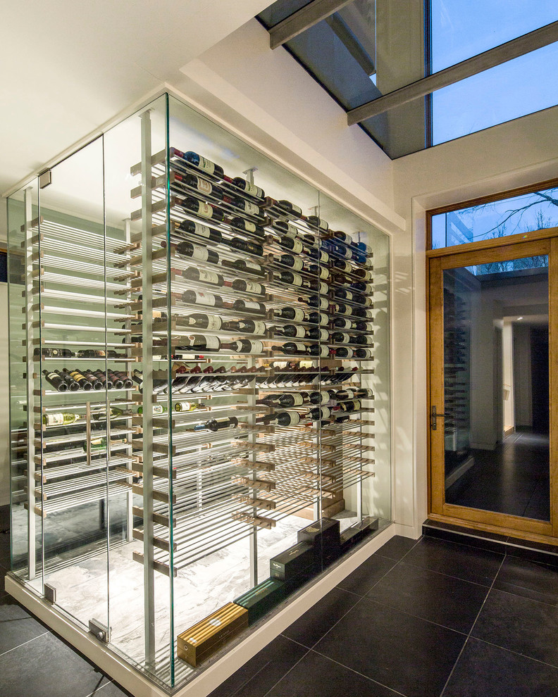 Inspiration for a contemporary wine cellar in Toronto with storage racks.